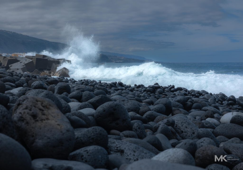 black rocks and waves